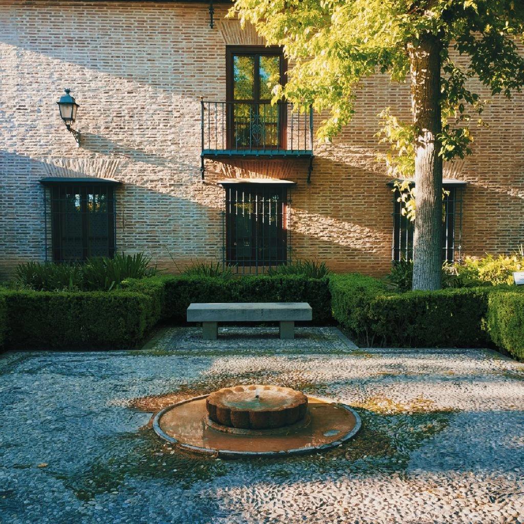 Garbatella garden courtyard at dusk with laundry hanging